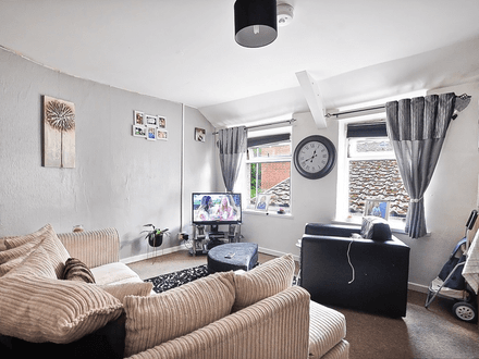 **INVESTMENT OPPORTUNITY** Three self contained income generating flats in town centre